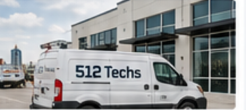 512 Techs service vehicle outside a commercial building