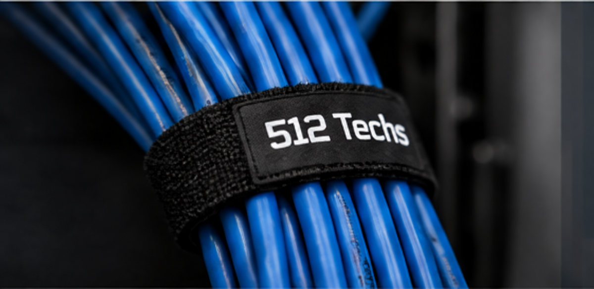 Organized blue network cabling secured with a 512 Techs cable wrap